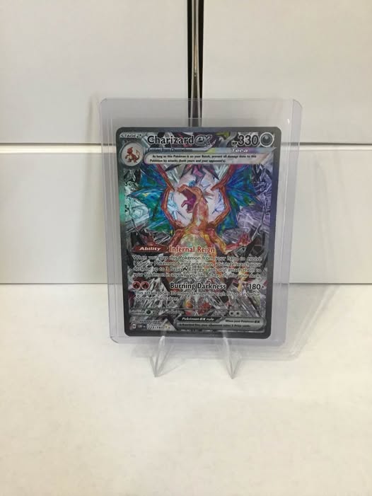 Charizard EX Pokémon Obsidian Flames | Used - like new - Facebook