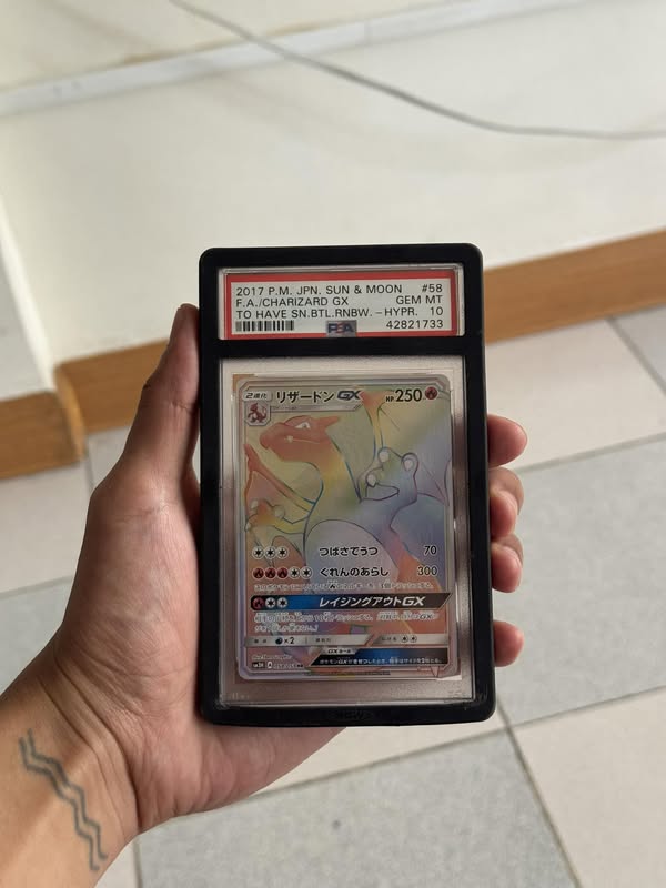 Reshiram & Charizard GX 217/214