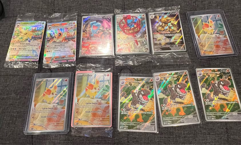 Flareon ex $14 - Team Rocket's Wobbuffet $10 - Riolu $11 - Facebook