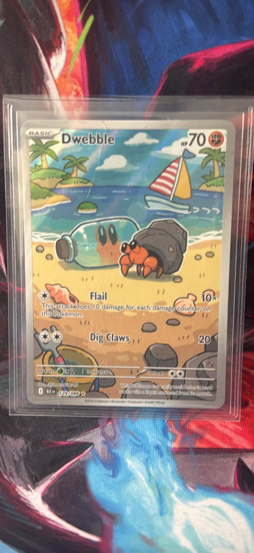 Clean Pokémon card is Basic Dwebble with 70 HP. Has two attacks ...