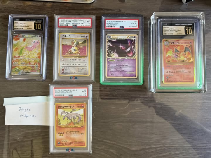 Pokemon cards for sale including mew and charizard