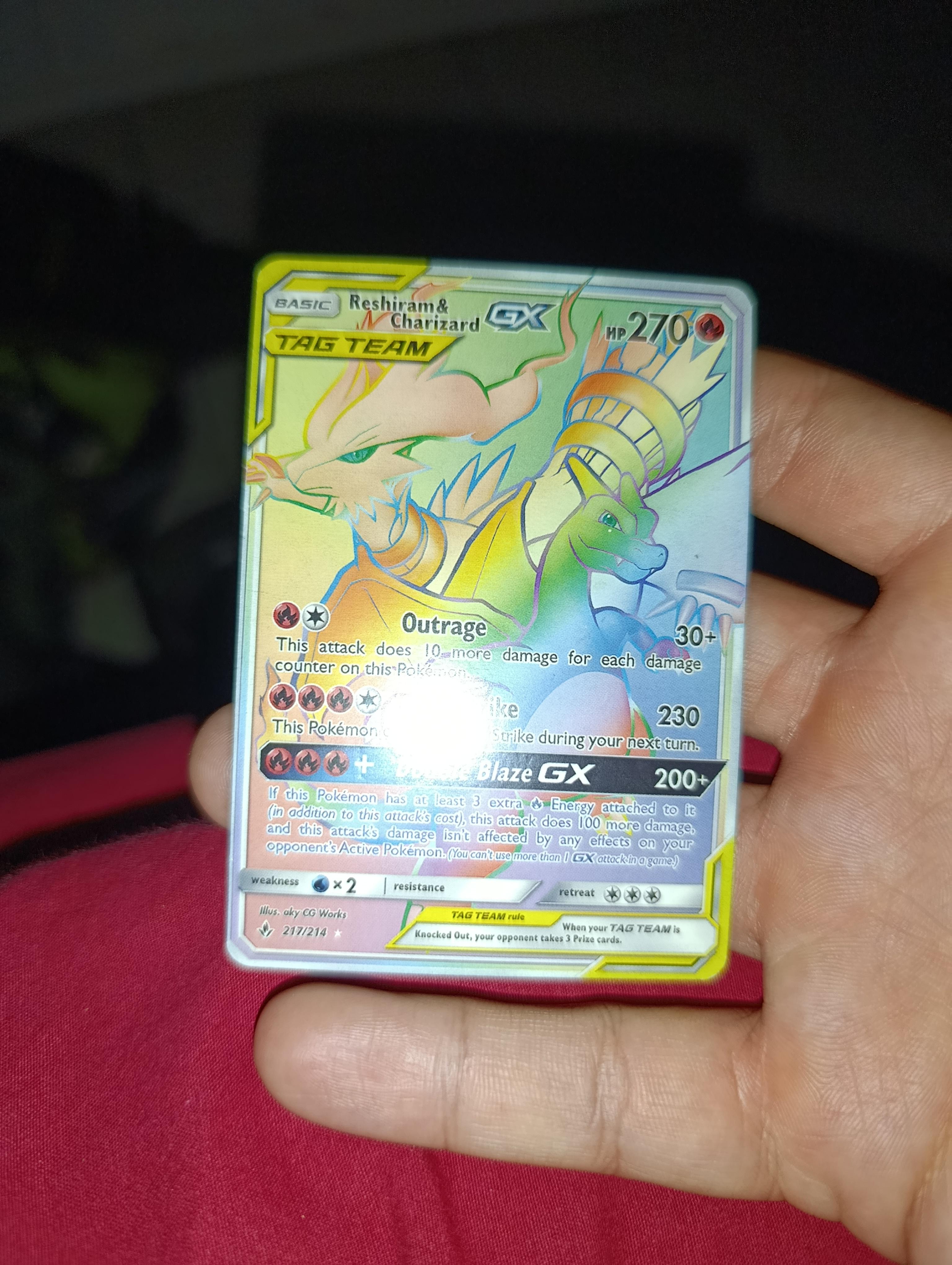 Reshiram & Charizard GX 217/216